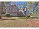 A charming single Gathering home with mature landscaping and a welcoming front porch at 2806 Peachtree Walk, Duluth, GA 30096