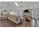 Bright living room features vaulted ceilings, skylight, stone fireplace, and hardwood floors at 2806 Peachtree Walk, Duluth, GA 30096