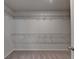 A walk-in closet with shelving on the wall at 4569 Grenadine Cir, Acworth, GA 30101
