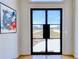 Bright foyer with hardwood floors, a view of the front yard, and modern decor at 2900 Waterford Dr, Conyers, GA 30094