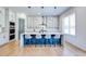 Kitchen with island, waterfall countertop, and stainless steel appliances at 2900 Waterford Dr, Conyers, GA 30094