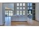 Open-concept living room with high ceilings, fireplace and hardwood floors at 2900 Waterford Dr, Conyers, GA 30094