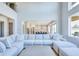 Spacious living room featuring sectional sofa and open kitchen layout at 2900 Waterford Dr, Conyers, GA 30094