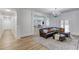Finished basement with seating area and a recreation area, creating a perfect entertainment space at 5394 Brendlynn Dr, Suwanee, GA 30024
