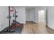 Well-equipped home gym with weight rack and workout bench at 5394 Brendlynn Dr, Suwanee, GA 30024