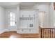 Convenient mudroom area with built-in storage and easy access to the home's exterior at 5394 Brendlynn Dr, Suwanee, GA 30024