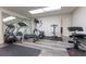 Well-equipped home gym with treadmills, stationary bike, mirrors, and rubber flooring at 85 Cliffside Crossing, Atlanta, GA 30350