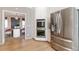 Kitchen with stainless steel refrigerator and oven, with formal dining room in the background at 85 Cliffside Crossing, Atlanta, GA 30350