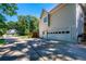 Spacious two-car garage and wide driveway, with well-maintained exterior and landscaping at 1107 Fieldstone Dr, Canton, GA 30114