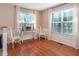 Cozy sitting area with wood floors, natural light, and elegant decor at 1107 Fieldstone Dr, Canton, GA 30114