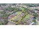 An aerial view of the property showcasing its large, rectangular shape surrounded by greenery at 1880 Ridgedale Dr, Snellville, GA 30078