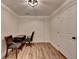 Finished basement office space with wood-look flooring and a minimalist design at 1880 Ridgedale Dr, Snellville, GA 30078