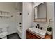 Stylish bathroom features a modern sink, toilet, tub and shower combo at 1880 Ridgedale Dr, Snellville, GA 30078