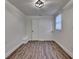 Neutral bedroom features light-colored floors, white walls, and natural light at 1880 Ridgedale Dr, Snellville, GA 30078