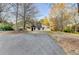 View of the front of a single-story home with neutral siding, a covered carport, and a well-kept yard at 1880 Ridgedale Dr, Snellville, GA 30078