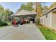 Carport features concrete flooring and ample space for parking at 1880 Ridgedale Dr, Snellville, GA 30078