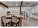 Modern kitchen with a large island, stainless steel appliances, and stylish barstool seating at 1880 Ridgedale Dr, Snellville, GA 30078