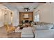 Cozy living room with wood accent wall, decorative beam, modern furniture, and neutral color palette at 1880 Ridgedale Dr, Snellville, GA 30078