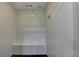 Newly tiled shower with a built-in bench and modern fixtures at 1880 Ridgedale Dr, Snellville, GA 30078