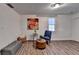 Cozy sitting area with stylish decor, window, and ample seating at 1880 Ridgedale Dr, Snellville, GA 30078