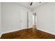 Standard bedroom design with wood floors, doors and a window for natural lighting at 2297 Sheryl Dr, Decatur, GA 30032