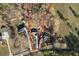 Aerial view showing the property boundaries, adjacent to a wooded lot and close to the road at 338 Rc Thompson Rd, Dallas, GA 30157