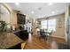 Modern kitchen featuring granite countertops, stainless steel appliances, and hardwood floors at 338 Rc Thompson Rd, Dallas, GA 30157