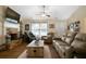 Cozy living room with a stone fireplace, hardwood floors, and comfortable seating at 338 Rc Thompson Rd, Dallas, GA 30157