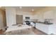 Bright eat-in kitchen featuring stainless steel appliances, granite countertops, and ample storage at 509 Campeche Dr, Locust Grove, GA 30248