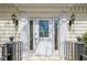 Elegant front door with sidelights and decorative trim at 5215 Silver Creek Dr, Lilburn, GA 30047