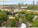 A scenic aerial view showcases the home's proximity to the Beltline, Ponce City Market, and O4W Park in vibrant Atlanta at 811 Ponce De Leon Ne Pl, Atlanta, GA 30306