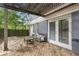 Comfortable back patio with wood decking, an outdoor seating area, and a pergola at 811 Ponce De Leon Ne Pl, Atlanta, GA 30306