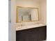 Bathroom features a dual vanity with granite counters and updated fixtures at 811 Ponce De Leon Ne Pl, Atlanta, GA 30306