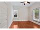 Cozy bedroom with two windows and hardwood floors provides a serene retreat with natural light at 811 Ponce De Leon Ne Pl, Atlanta, GA 30306