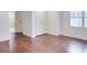 Bedroom featuring hardwood flooring, large closet, and natural light at 811 Ponce De Leon Ne Pl, Atlanta, GA 30306
