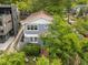 Charming two-story home with mature trees in the front yard at 811 Ponce De Leon Ne Pl, Atlanta, GA 30306