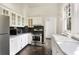 Bright kitchen featuring stainless steel appliances, white cabinets, and classic finishes at 811 Ponce De Leon Ne Pl, Atlanta, GA 30306