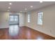 Spacious room with hardwood floors, recessed lighting, and multiple windows at 811 Ponce De Leon Ne Pl, Atlanta, GA 30306