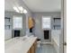 Bathroom featuring a shower and tub, toilet, gray walls, and a wood vanity with mirror at 1545 Smoke Hill Dr, Hoschton, GA 30548