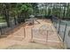 Community playground with a variety of equipment, providing a safe and fun space for children at 1545 Smoke Hill Dr, Hoschton, GA 30548