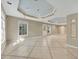 Bright basement with tile flooring, neutral paint and windows providing natural light at 11770 Ashwick Pl, Johns Creek, GA 30005