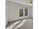 Bedroom featuring natural light from two windows at 11770 Ashwick Pl, Johns Creek, GA 30005