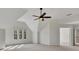 Bright, spacious bedroom features a vaulted ceiling and multiple windows at 11770 Ashwick Pl, Johns Creek, GA 30005