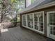 Wooden deck with views of the backyard at 11770 Ashwick Pl, Johns Creek, GA 30005