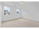 Bright bedroom with two windows and plush carpeting at 1512 Parks Edge Nw Ln, Atlanta, GA 30318