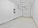 Spacious two-car garage with concrete flooring and automatic door at 1512 Parks Edge Nw Ln, Atlanta, GA 30318