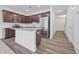 Modern kitchen featuring stainless steel appliances and a granite countertop island at 1512 Parks Edge Nw Ln, Atlanta, GA 30318
