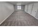 Spacious basement with neutral carpet and natural light at 5922 Graywood Cir, Mableton, GA 30126