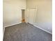 Bedroom with neutral carpeting and a closet with double doors at 5922 Graywood Cir, Mableton, GA 30126