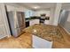 Modern kitchen with stainless steel appliances, granite countertops, and a center island at 5922 Graywood Cir, Mableton, GA 30126